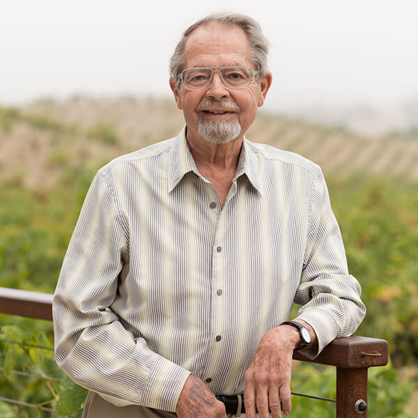 Paul Draper in front of the vineyard