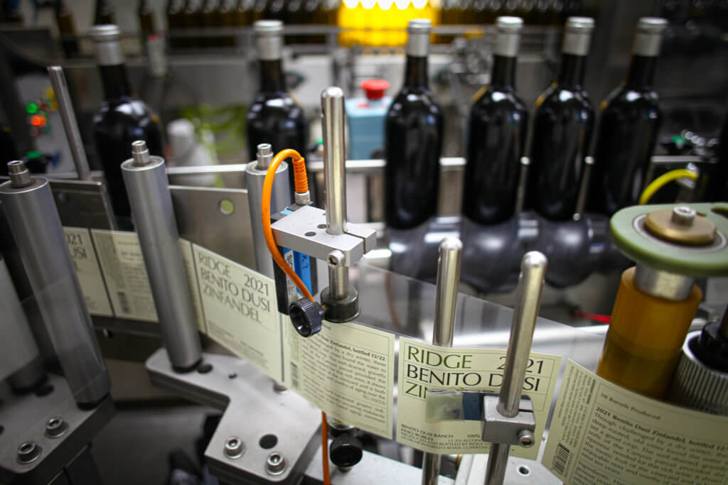 labels prepped to be adhered to wine bottles