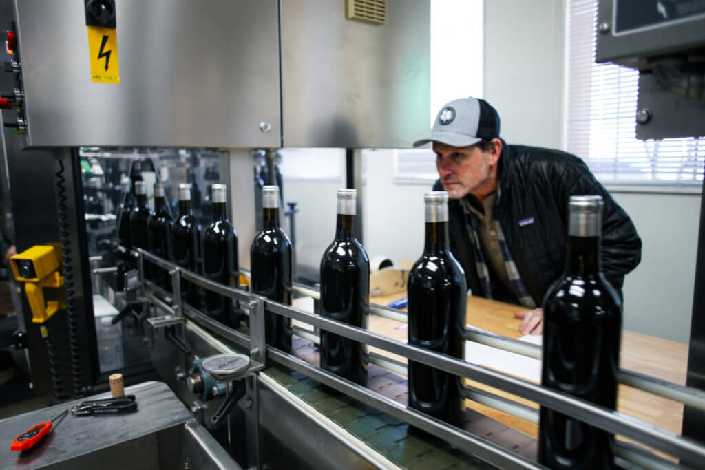 Winemaker Trester Goetting oversees the bottling line